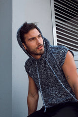 Circulo Jeans – 100% Brazilian Cotton Denim Effect Yarn (132m/100g) - Man wearing a blue sleeveless hooded knit top made with Circulo Jeans yarn.
