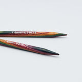 knitpro-symfonie-2-interchangeable-needle-tips-special-13cm - Two wooden knitting needles with a marbled rainbow finish, featuring white printed text '7.0mm - US10.