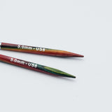 Knitpro-symfonie-2-interchangeable-needle-tips-special-10cm - Two wooden knitting needles with a red, green, and gold marbled pattern, marked with '5.0mm - US8' in white text, on a plain white background.