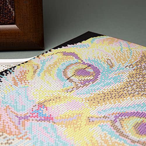 DIY embroidery pattern of a red kitty in progress with beads and needle