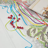 Partially completed Autumn beaded cross stitch with intricate detailing.Partially completed Autumn beaded cross stitch with intricate detailing.